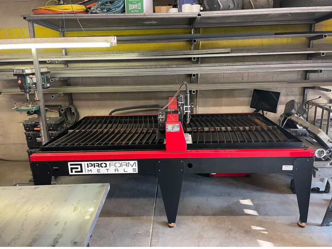 CNC plasma cutting table at Pro Form Metals fabrication shop in Reno Nevada