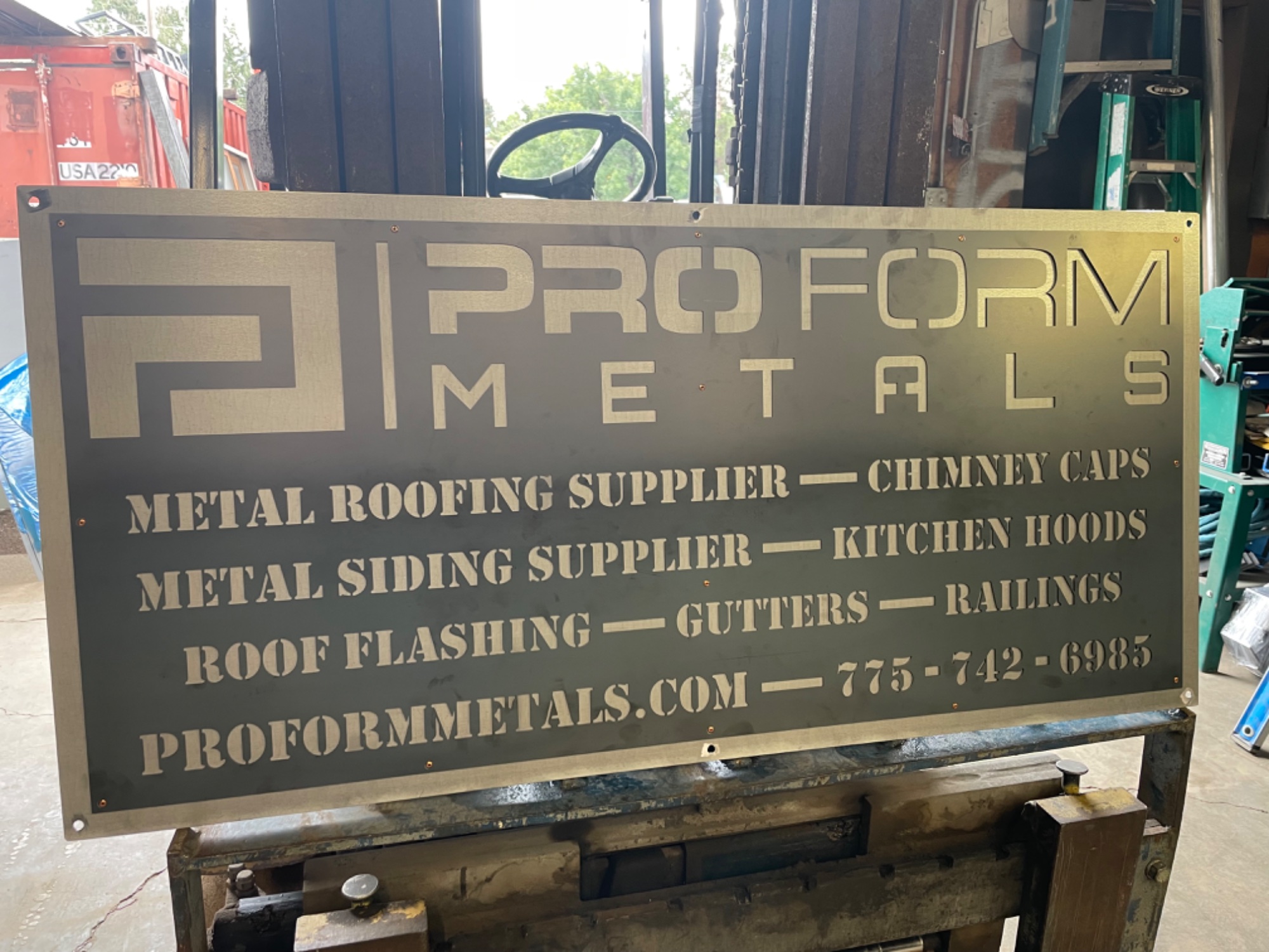 CNC plasma cut metal sign at Pro Form Metals shop entrance Reno Nevada