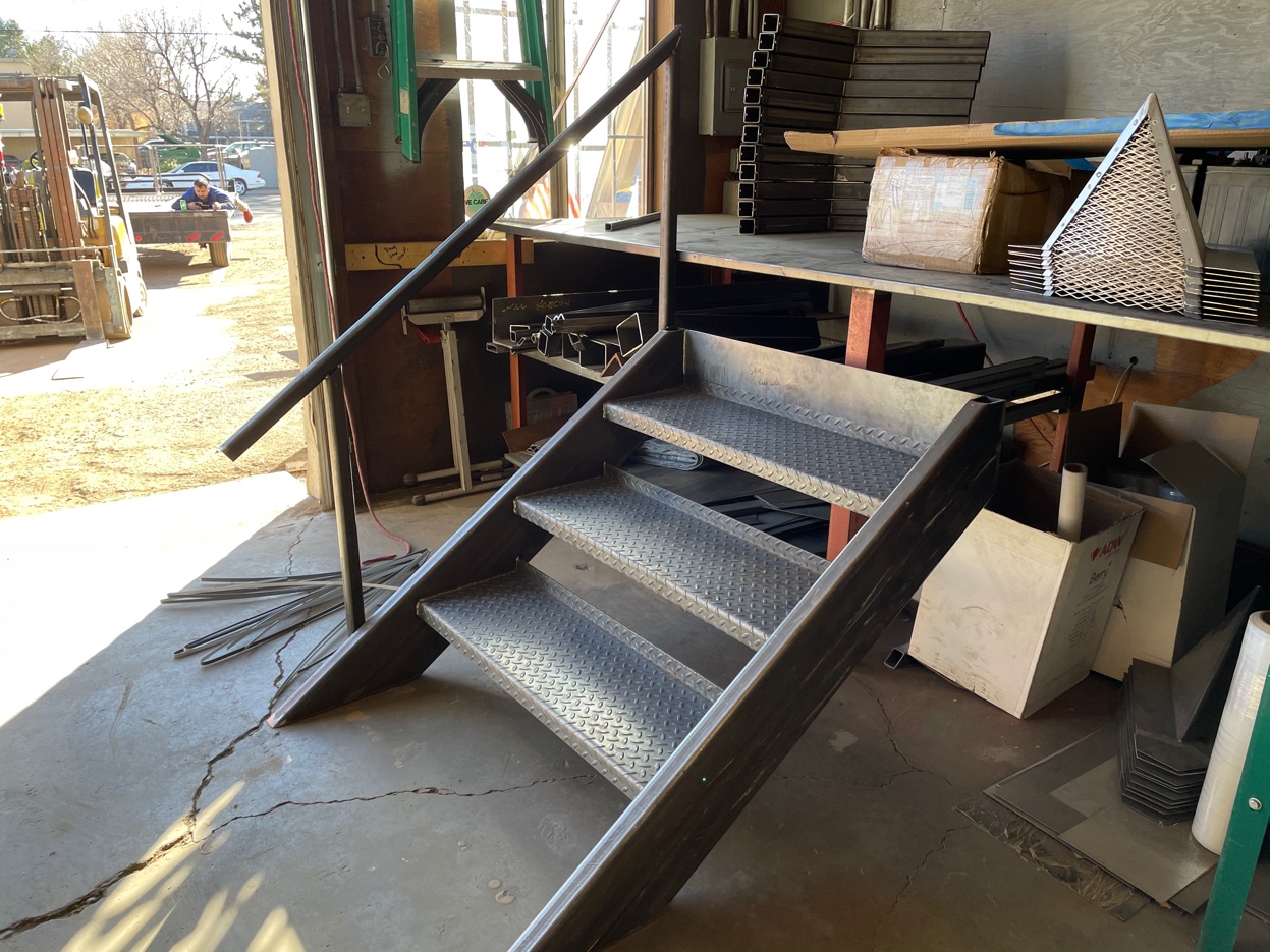 Custom steel stairs and railing by Pro Form Metals